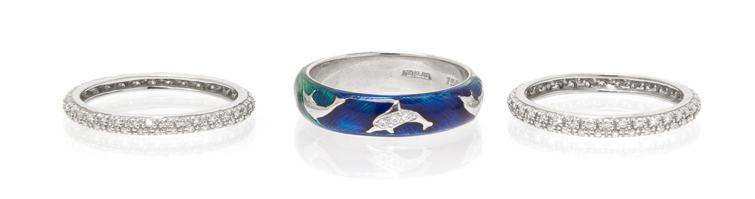 A Collection of White Gold, Polychrome Enamel and Diamond Rings, 6.60 dwts.