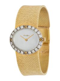 BUECHE GIRARD, YELLOW GOLD, DIAMOND AND MOTHER-OF-PEARL WATCH