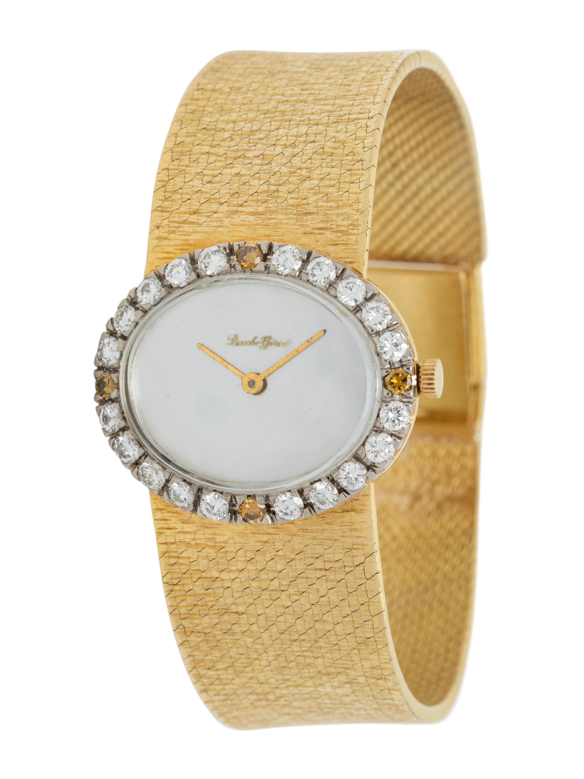 BUECHE GIRARD, YELLOW GOLD, DIAMOND AND MOTHER-OF-PEARL WATCH