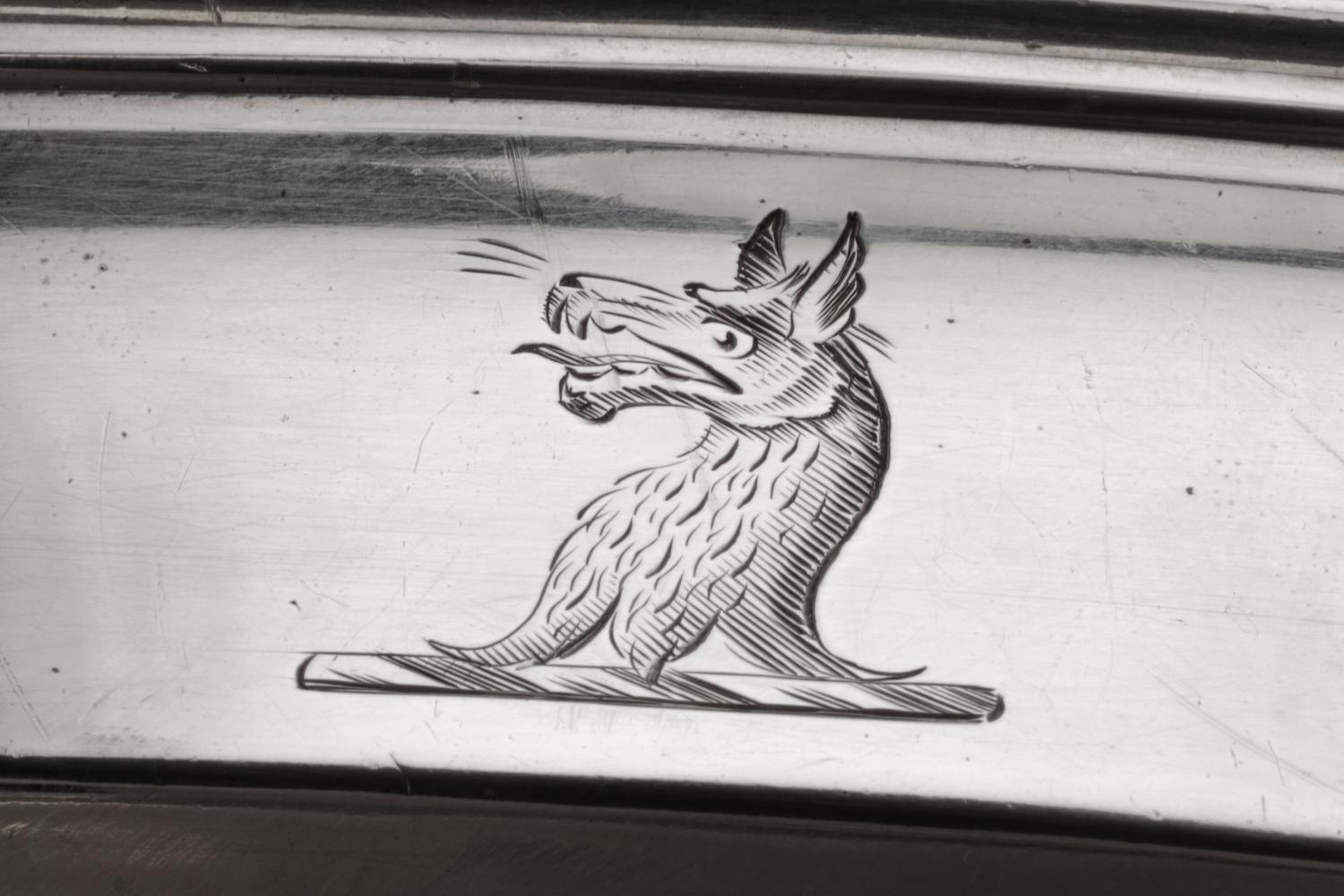 A George III Silver Tray, William Stroud, London, 1802, of oval form with a gadroon rim, the border with engraved crests.