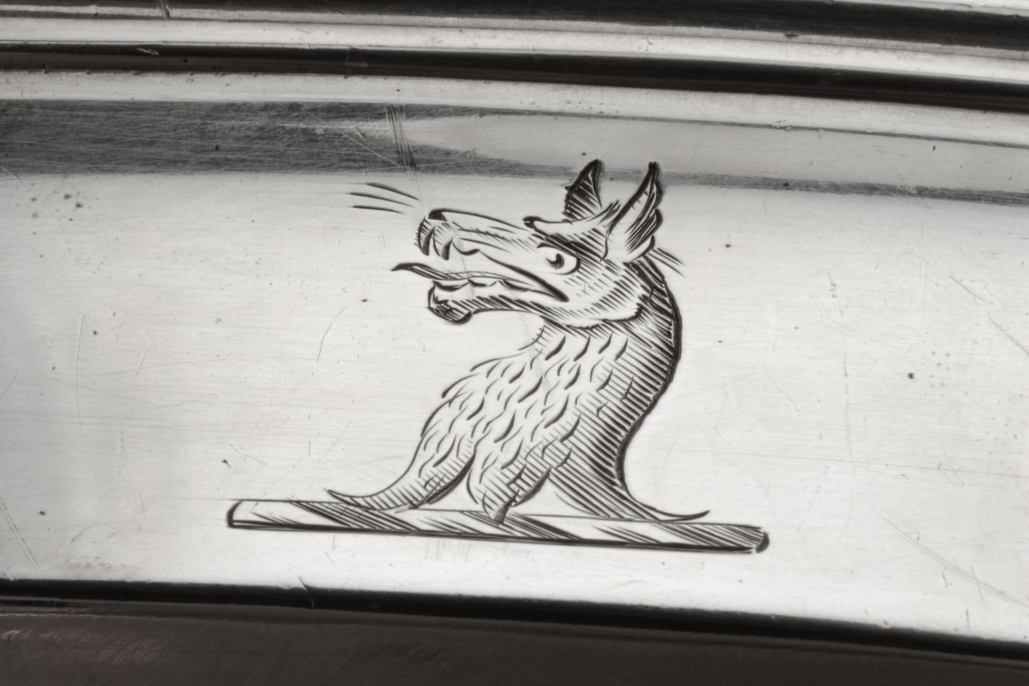 A George III Silver Tray, William Stroud, London, 1802, of oval form with a gadroon rim, the border with engraved crests.