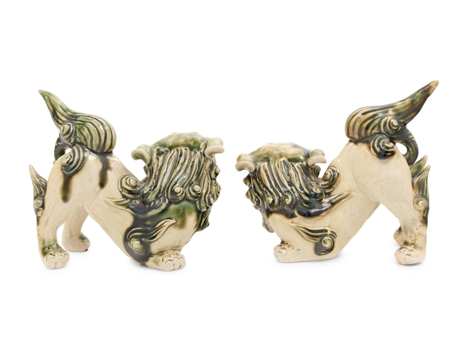 A Pair of Chinese Porcelain Guardian Lions
