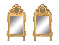 A Pair of Italian Carved Giltwood Mirrors