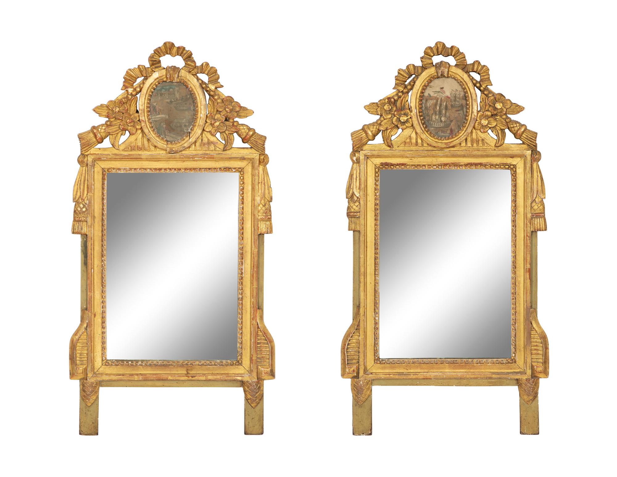 A Pair of Italian Carved Giltwood Mirrors