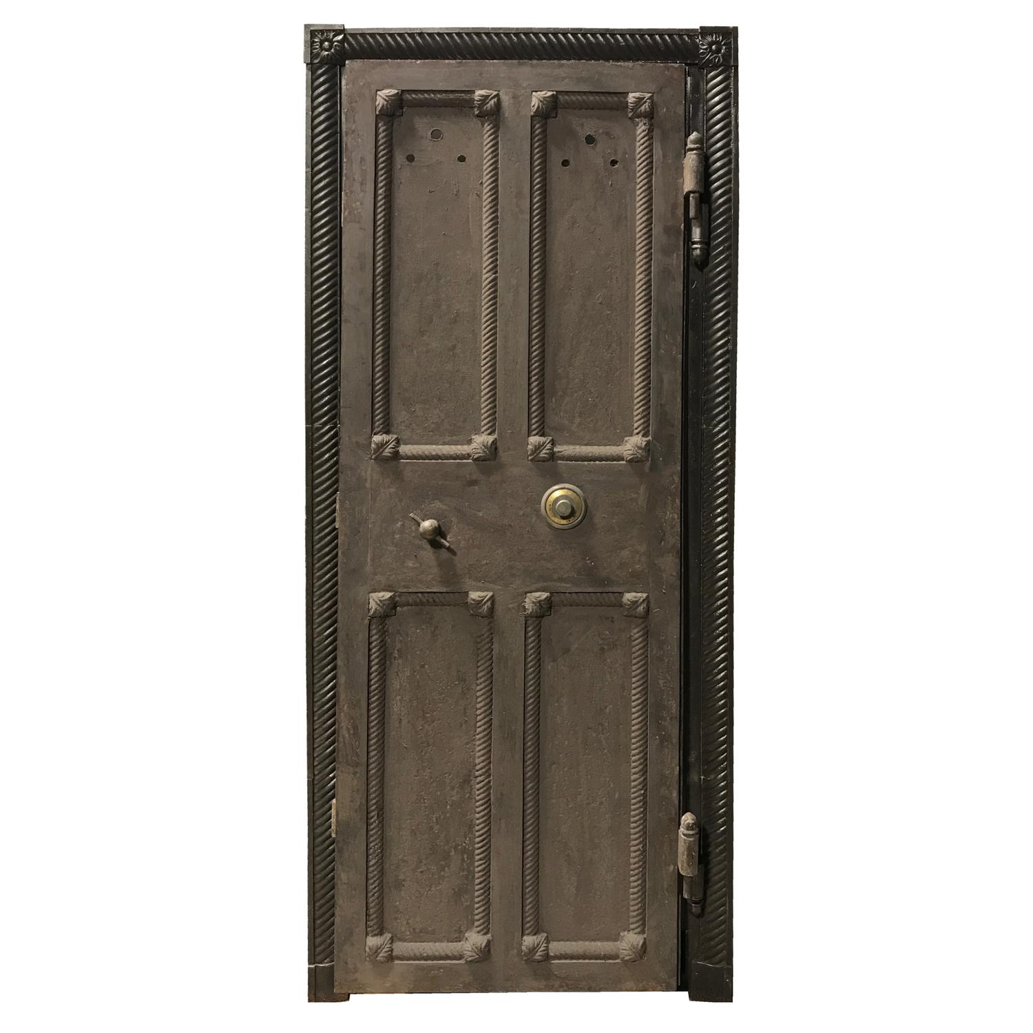 A Cast Iron Safe Door with Frame and Combination 36" W x 4" D x 84" H — United States, 20th Century
