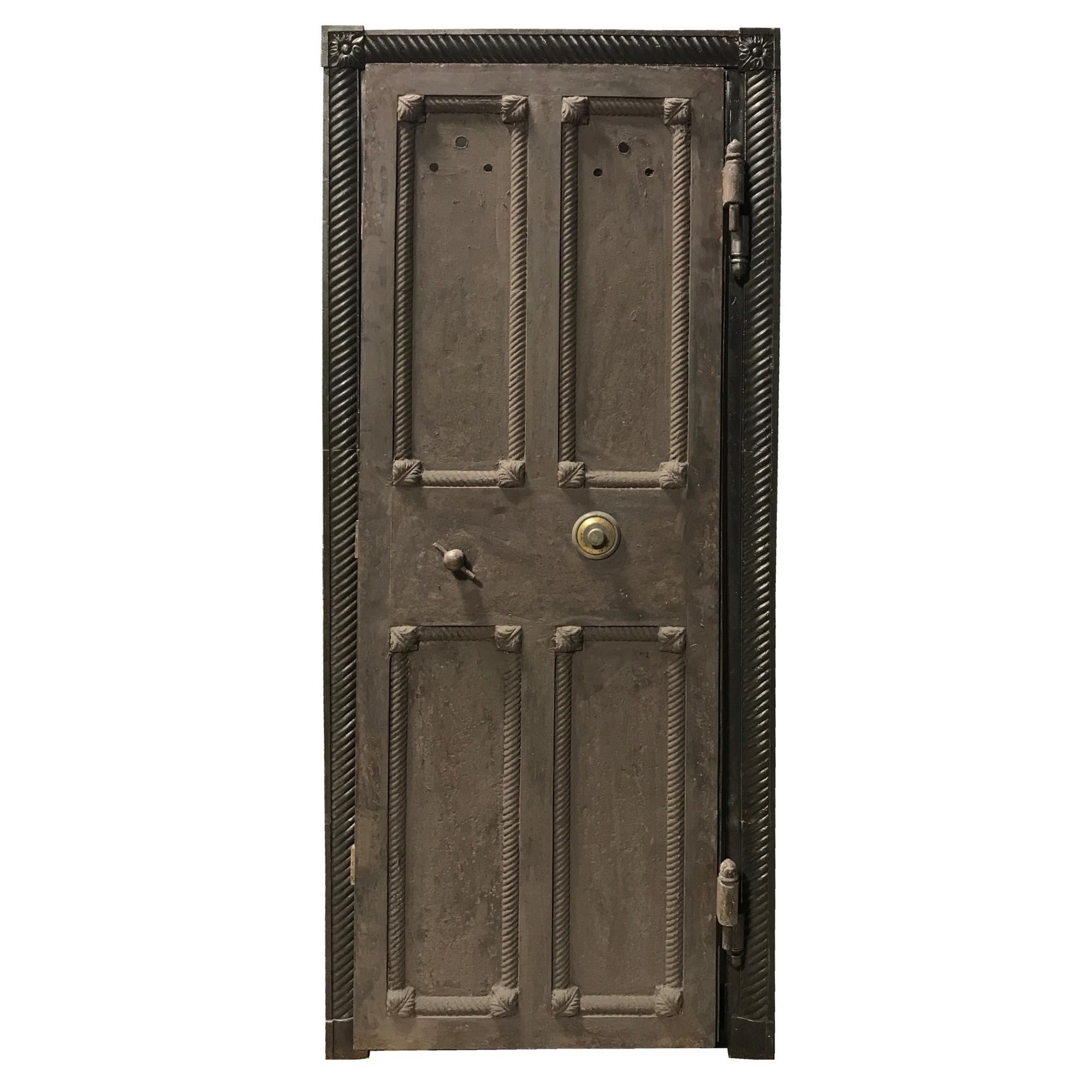 A Cast Iron Safe Door with Frame and Combination 36" W x 4" D x 84" H — United States, 20th Century