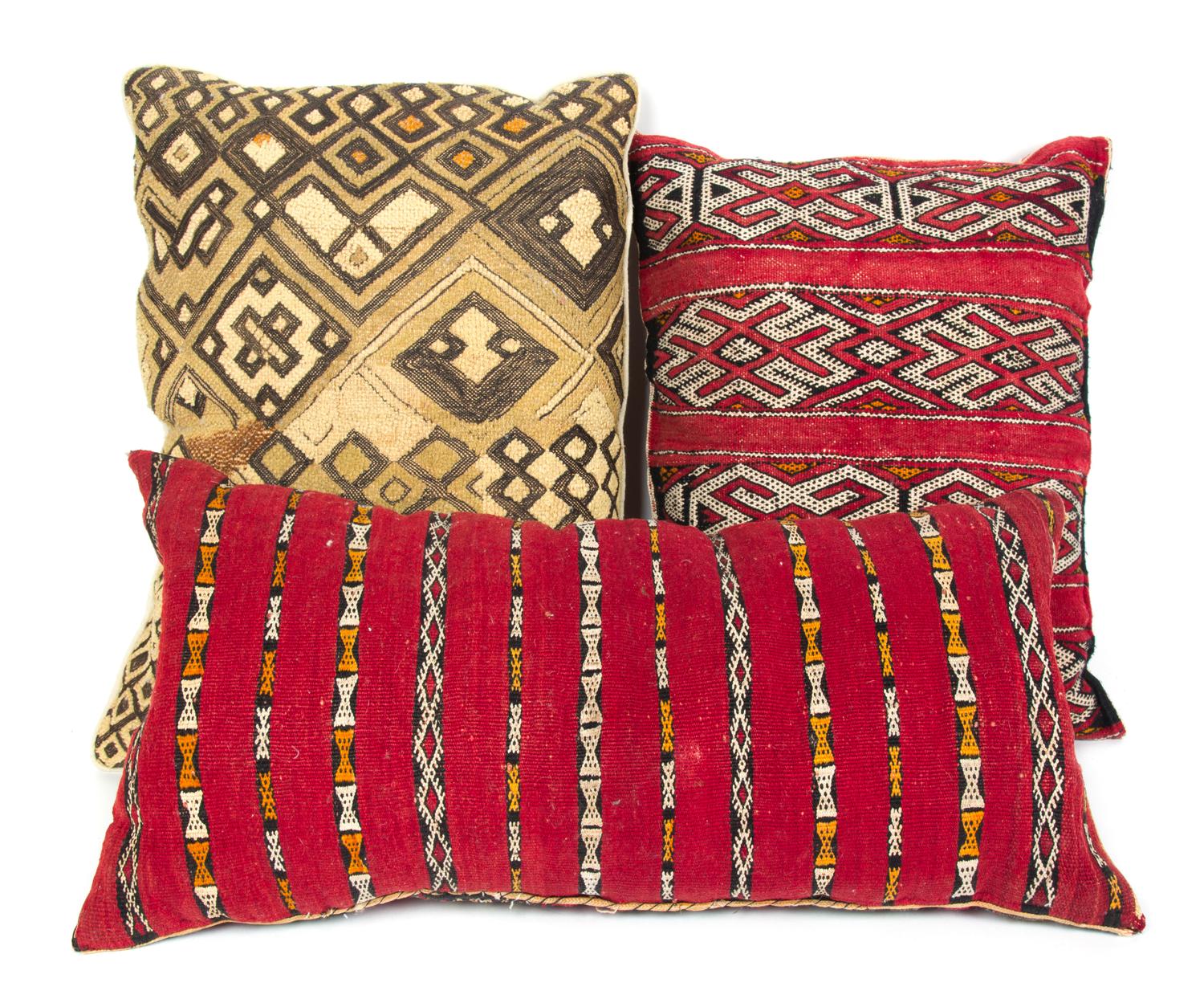 A Group of Twelve Pillows Largest: 19 1/2 x 16 1/2 inches.
