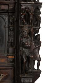 A Continental Baroque Walnut Cabinet