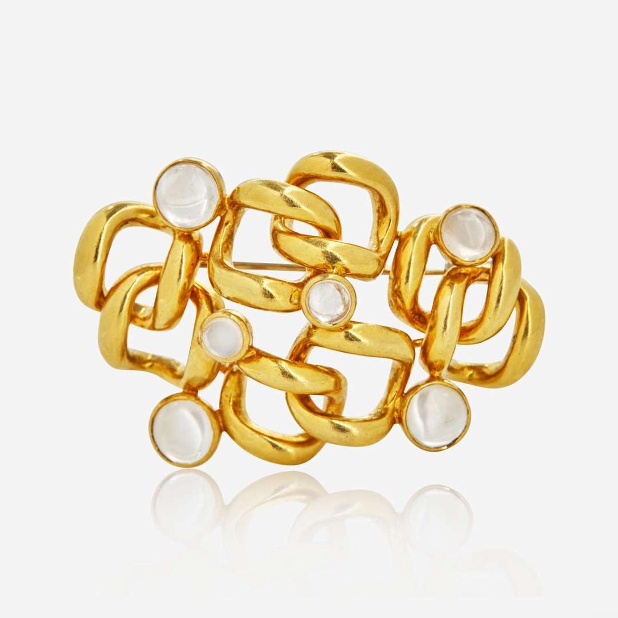 An 18K Yellow Gold and Moonstone Brooch