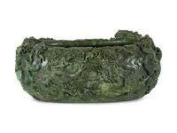 A Large Chinese Green Hardstone Fish Pot