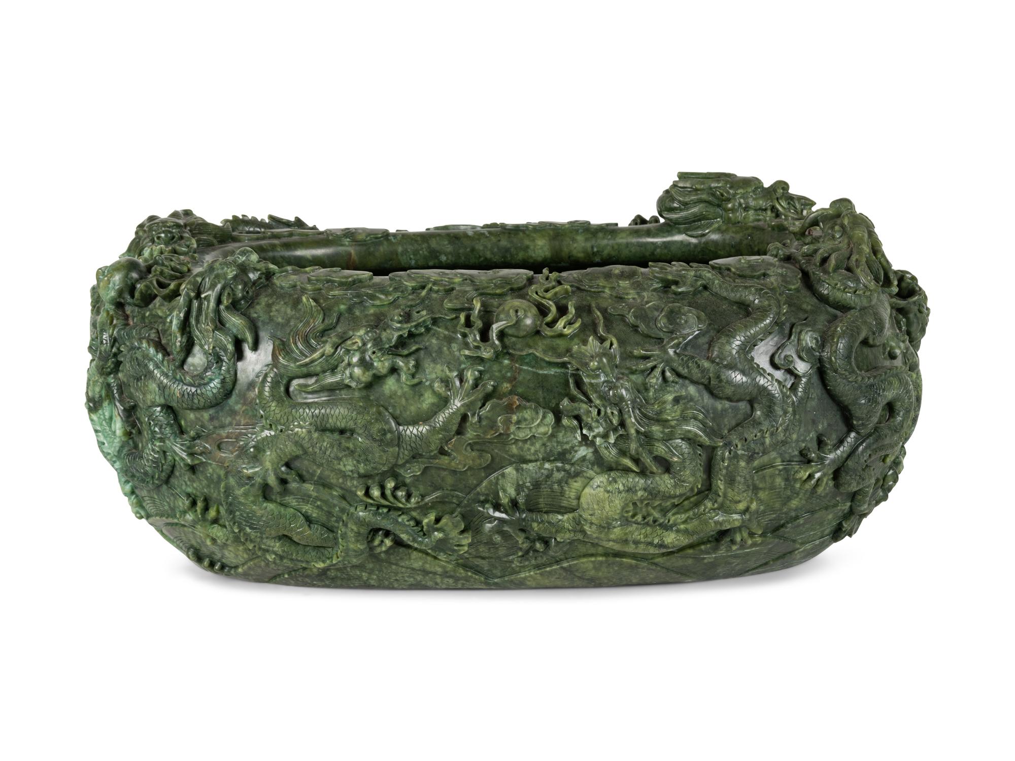 A Large Chinese Green Hardstone Fish Pot