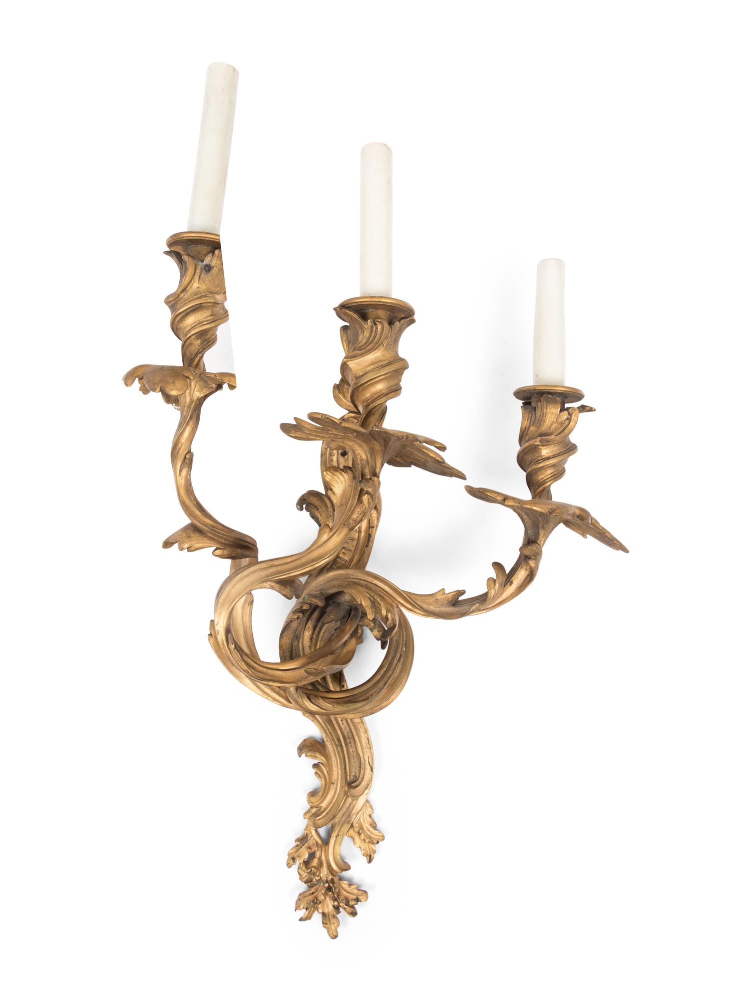 A Set of Four Louis XV Style Gilt Bronze Three-Light Sconces