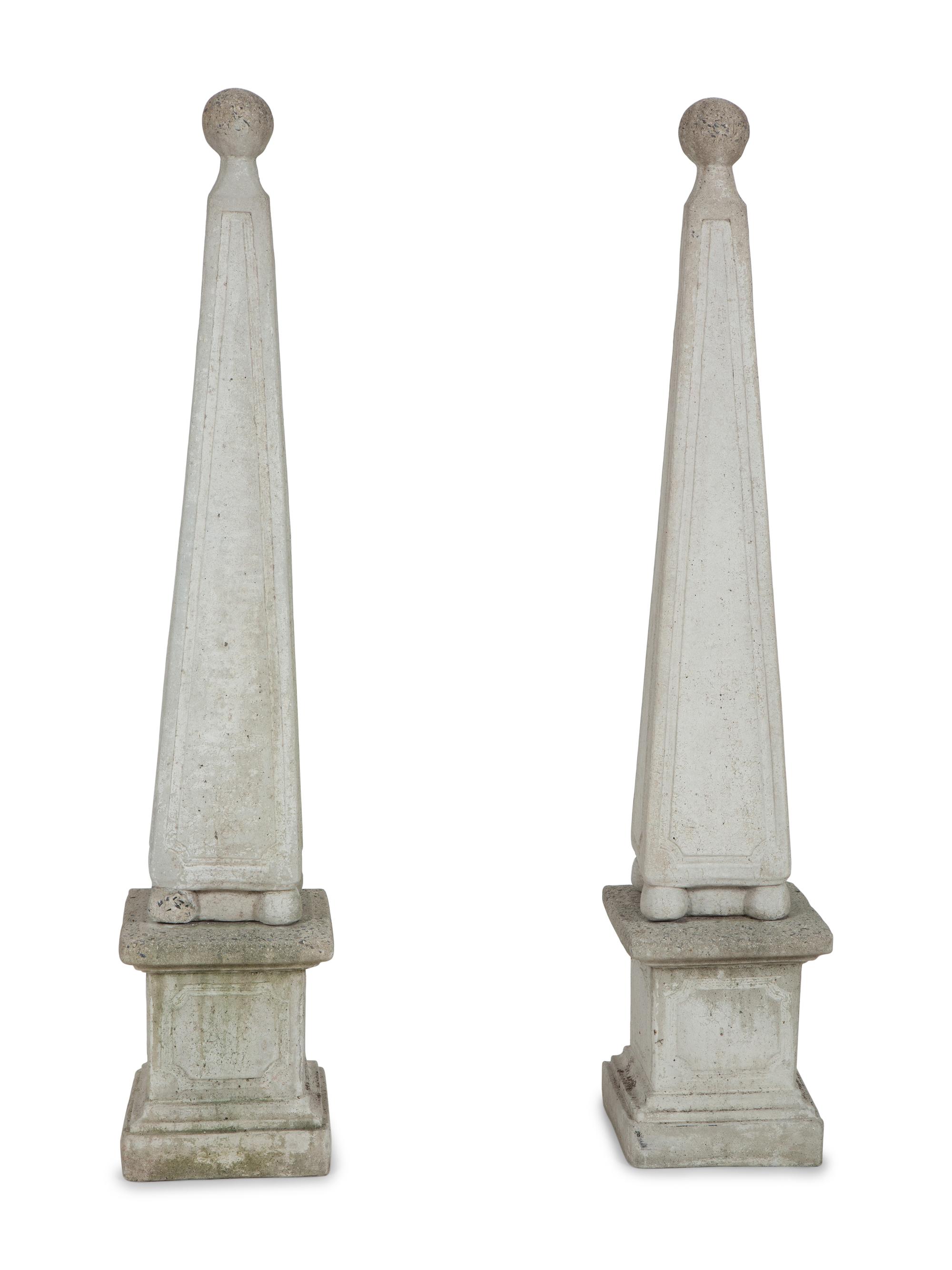 A Pair of Cast Stone Obelisks on Bases