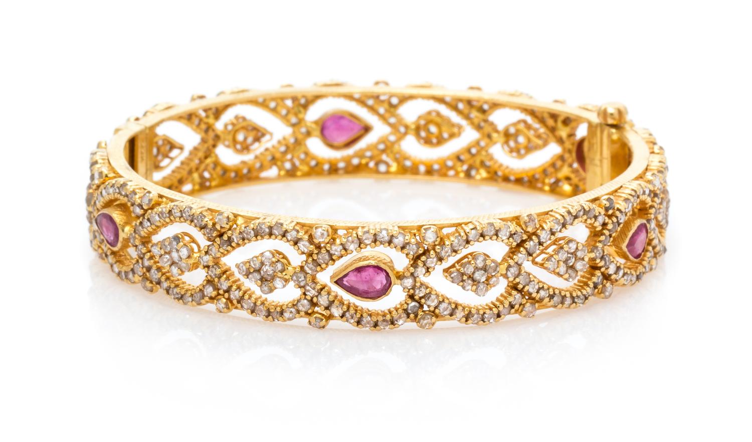 A 22 Karat Yellow Gold, Ruby and Diamond Bangle Bracelet, 24.10 dwts.