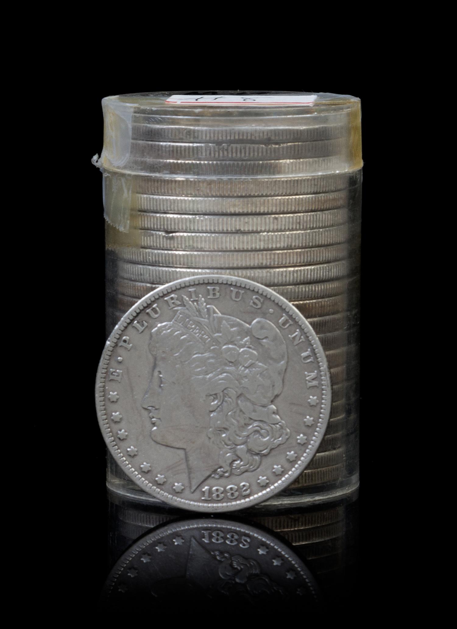 A Group of Twenty-Two United States Morgan Silver Dollars