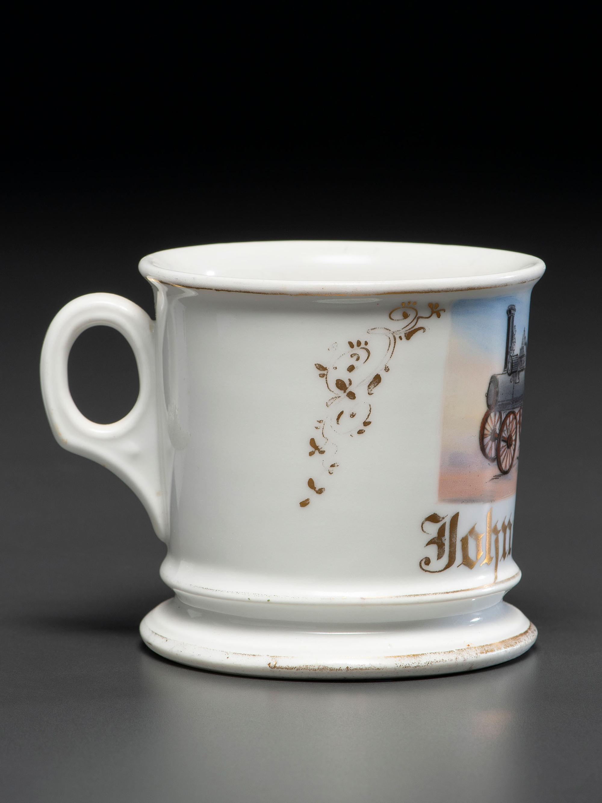 A Porcelain Occupational Shaving Mug Depicting a Steam Tractor
