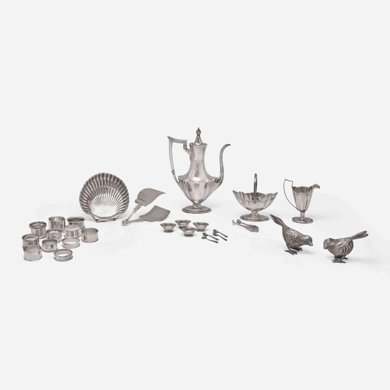 An assorted collection of twenty-five sterling silver, silver, and silverplated table items Various makers, many by Gorham Mfg. Co, Providence, RI, retailed by J.E. Caldwell, Philadelphia, PA, 20th century