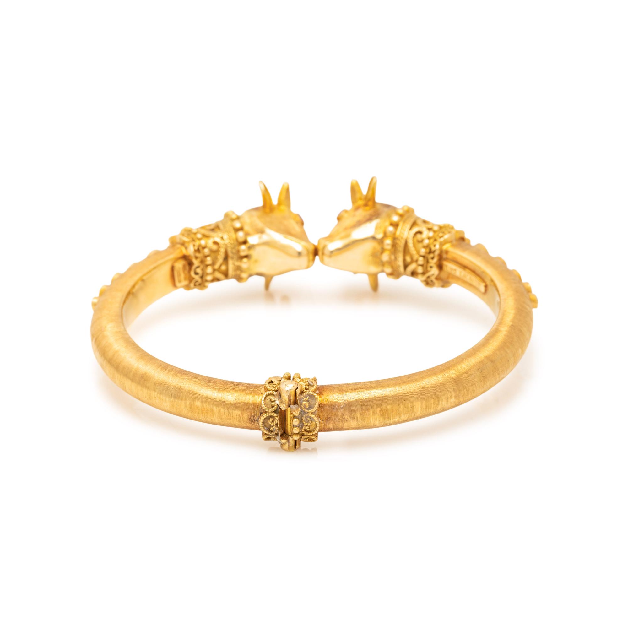 LALAOUNIS, YELLOW GOLD AND RUBY BANGLE BRACELET