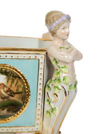 A Continental Porcelain Jardinière and Stand