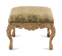 A Continental Rococo Style Carved Giltwood Stool