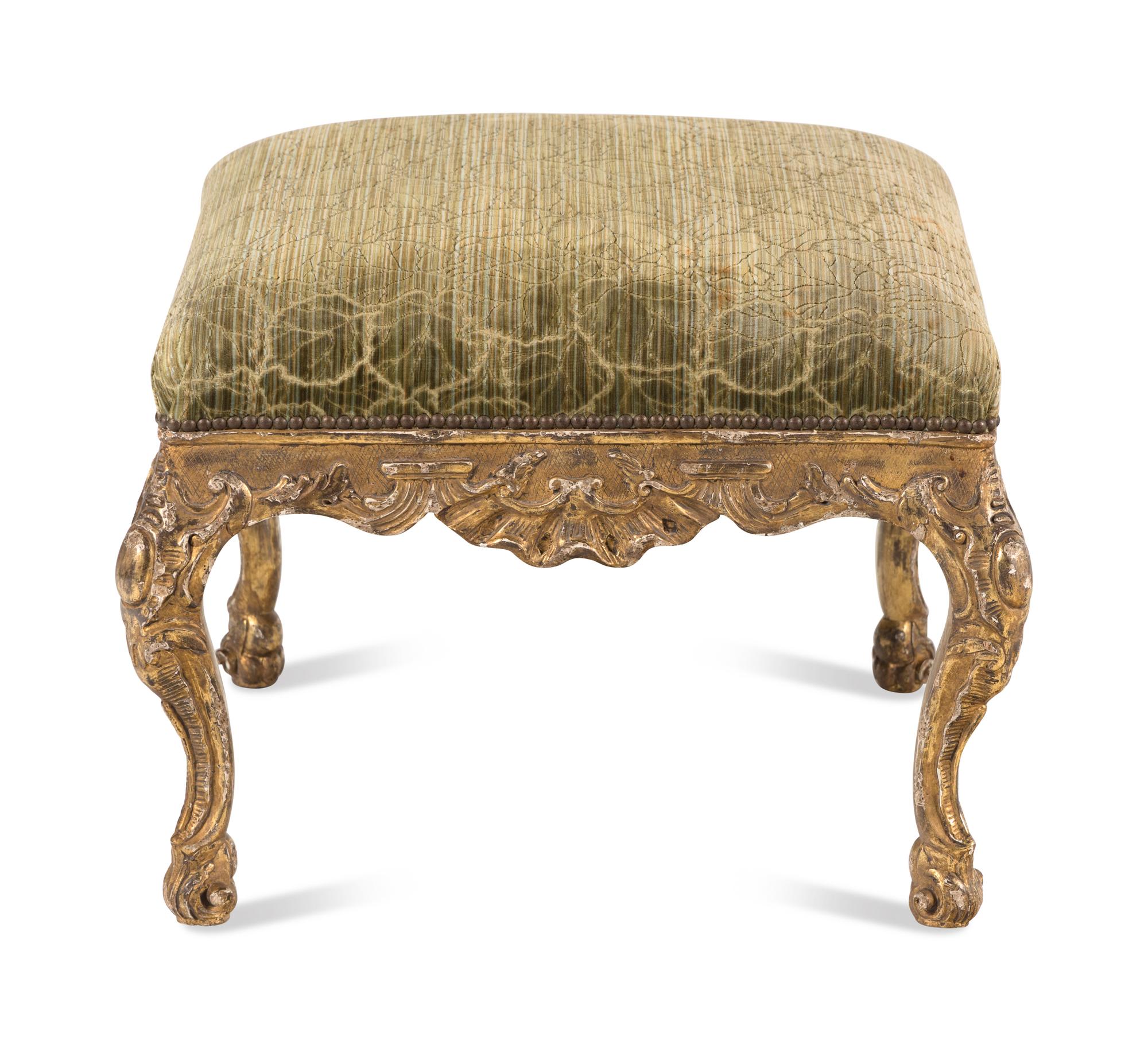 A Continental Rococo Style Carved Giltwood Stool