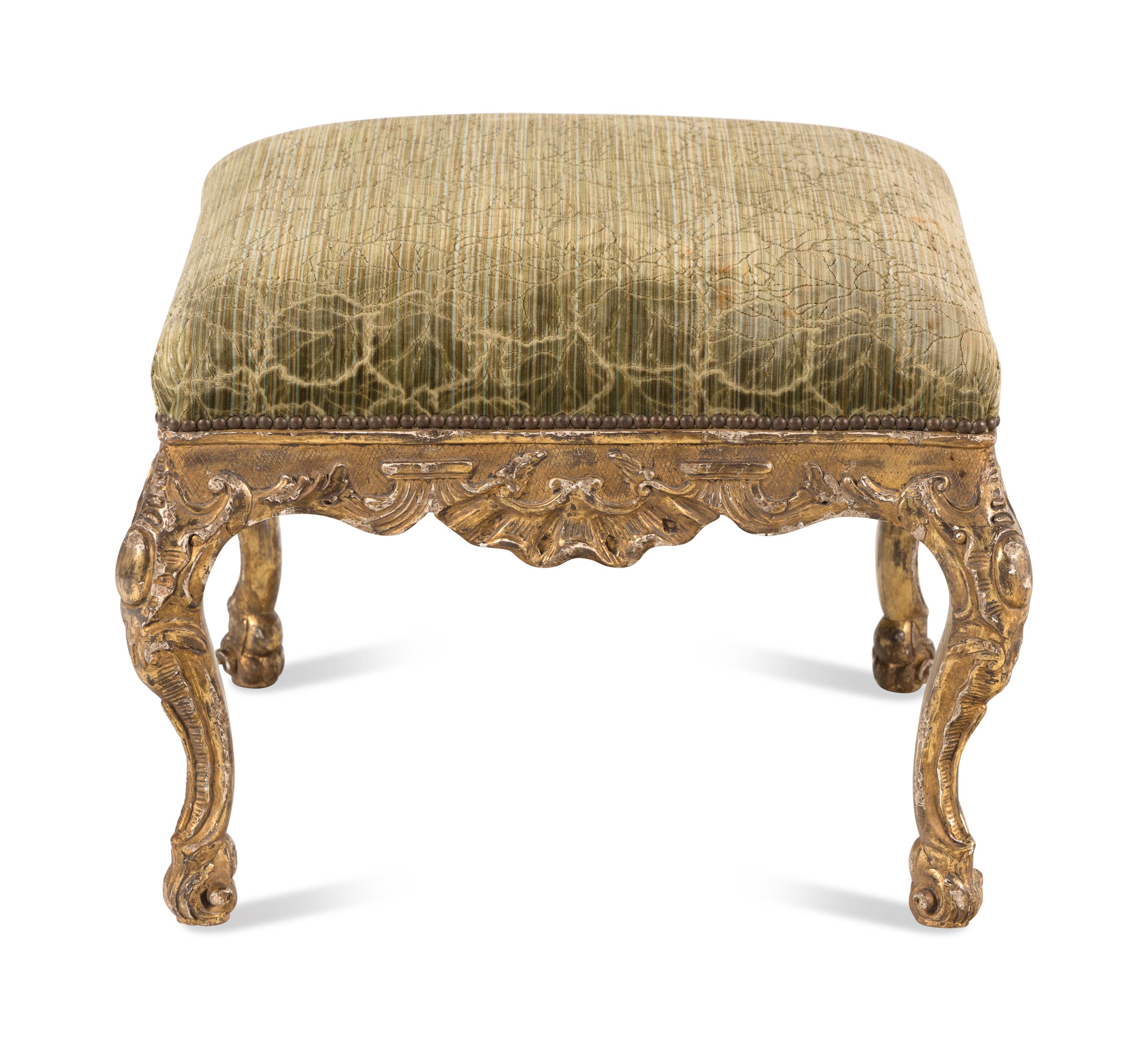 A Continental Rococo Style Carved Giltwood Stool