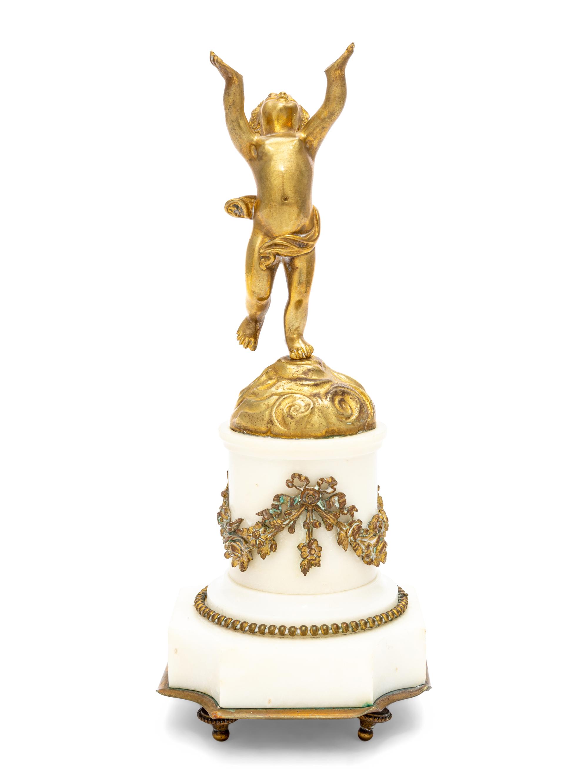 A Gilt Bronze and Marble Putto Ornament
