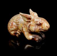 A Jade Carving of a Rabbit Width 6 1/2 inches.