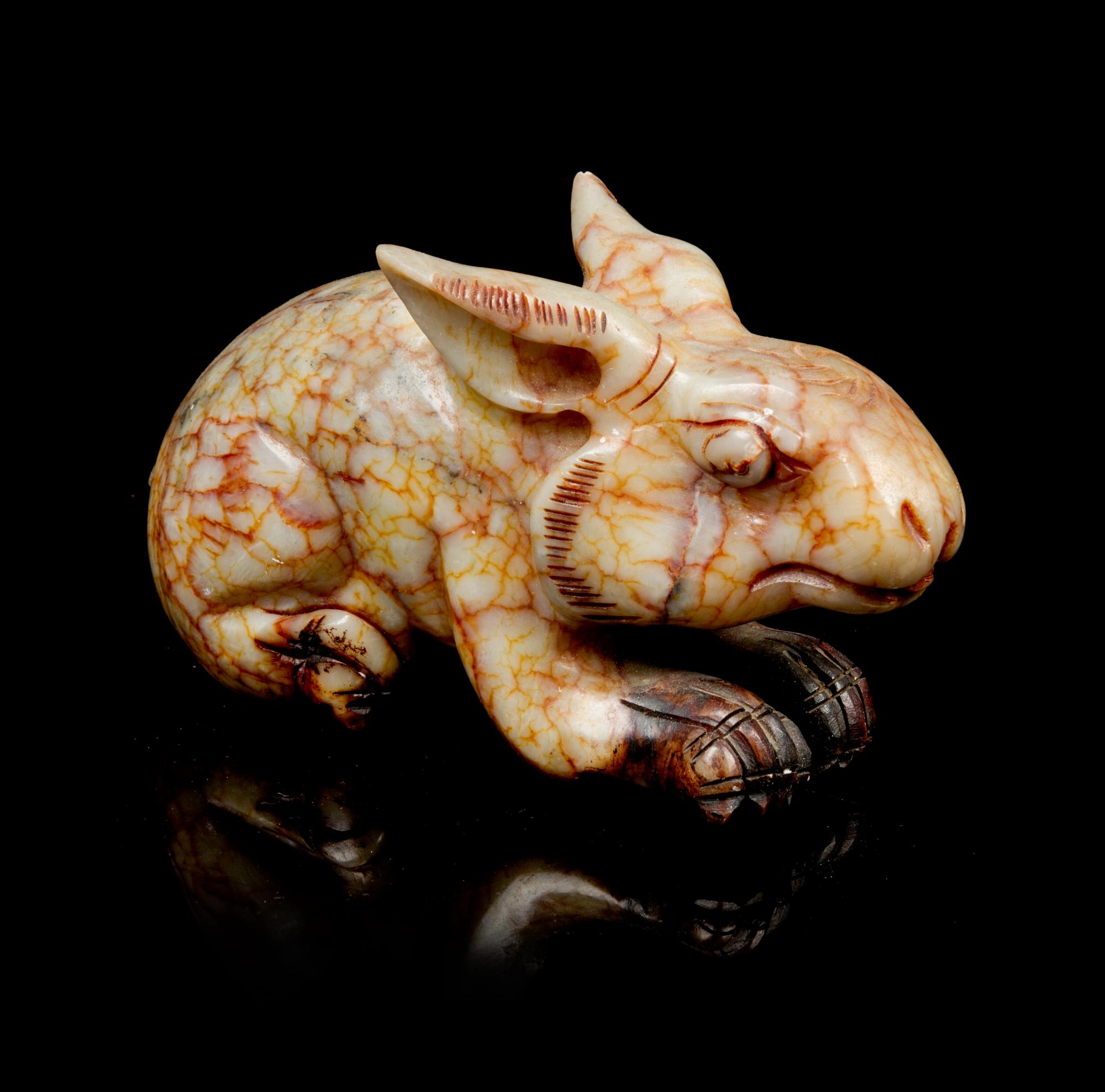A Jade Carving of a Rabbit Width 6 1/2 inches.