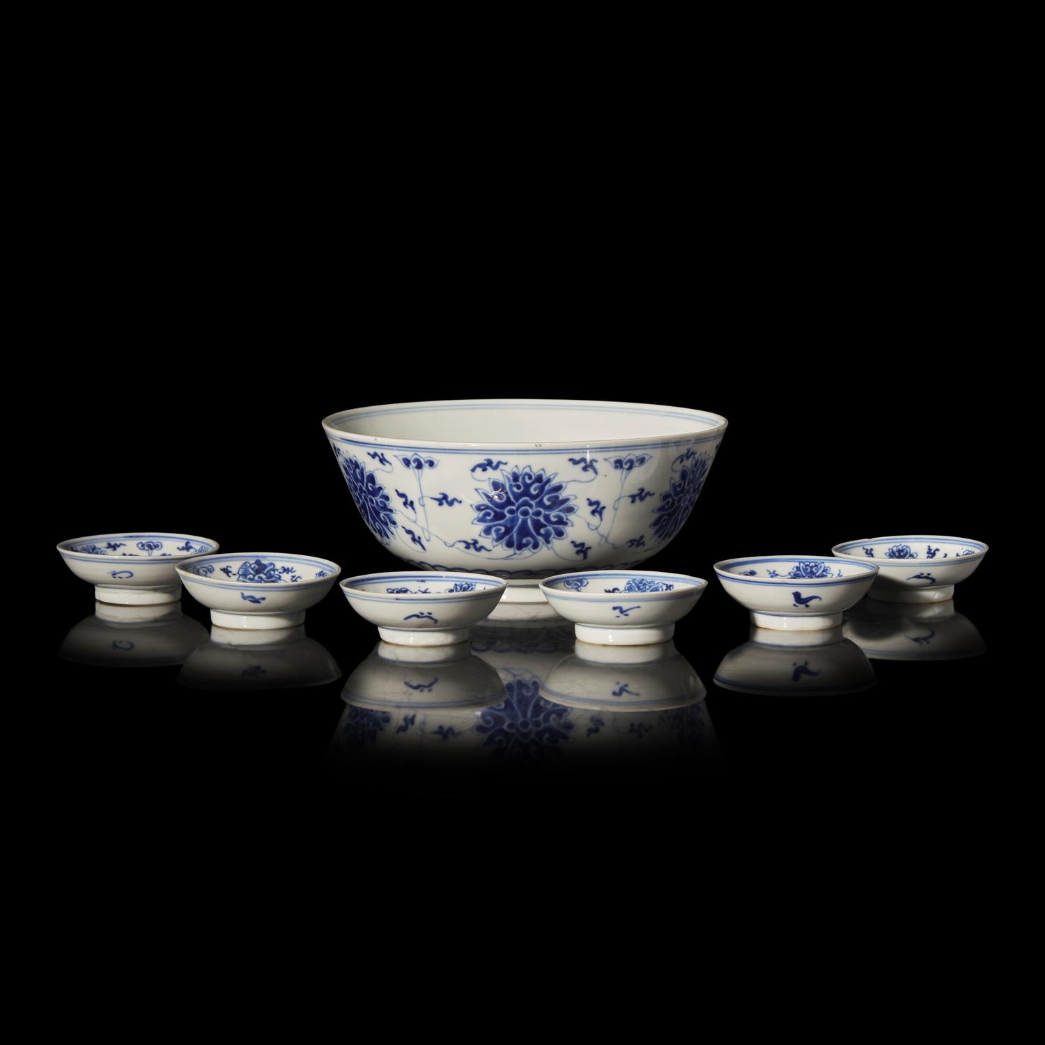 A Group of Seven Chinese Blue and White "Lotus" Dishes, 19th to 20th Century 晚清-民國 青花纏枝蓮紋瓷碗一組七件