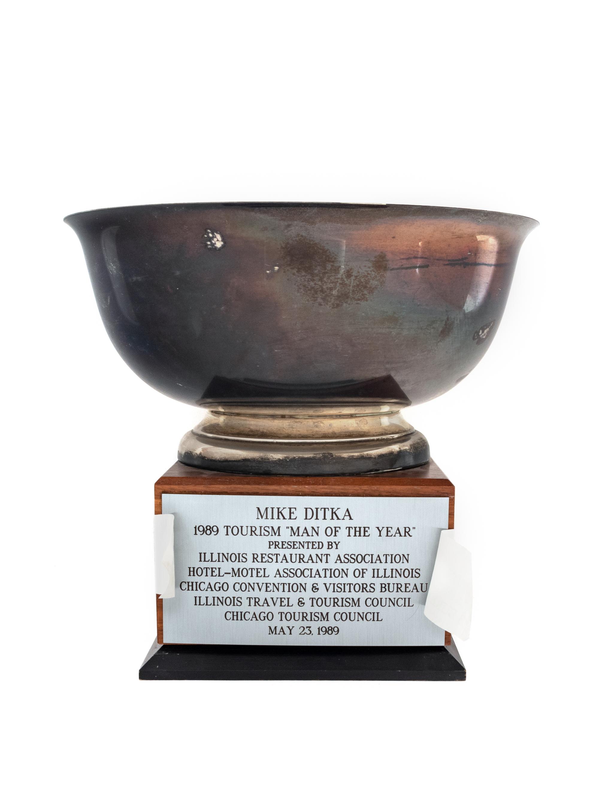 A 1989 Tourism Man Of The Year Trophy Awarded to Mike Ditka Formerly Displayed at Mike Ditka's Restaurant