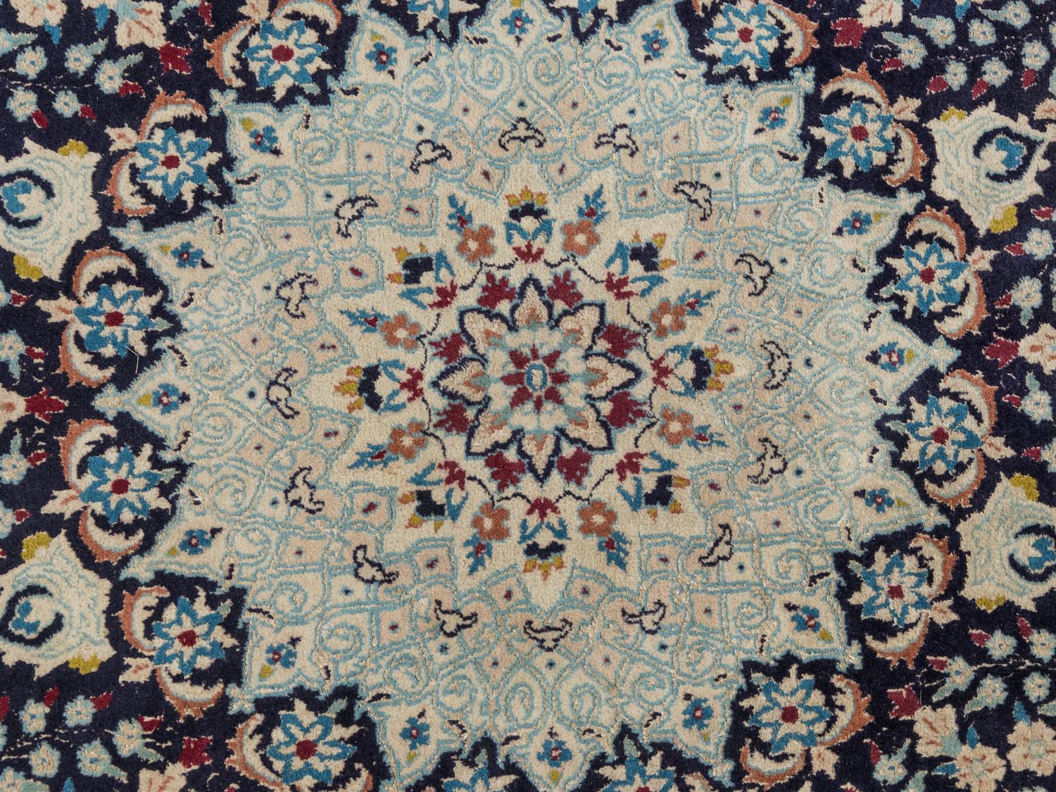 A Persian Nain Wool Circular Rug