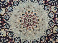 A Persian Nain Wool Circular Rug