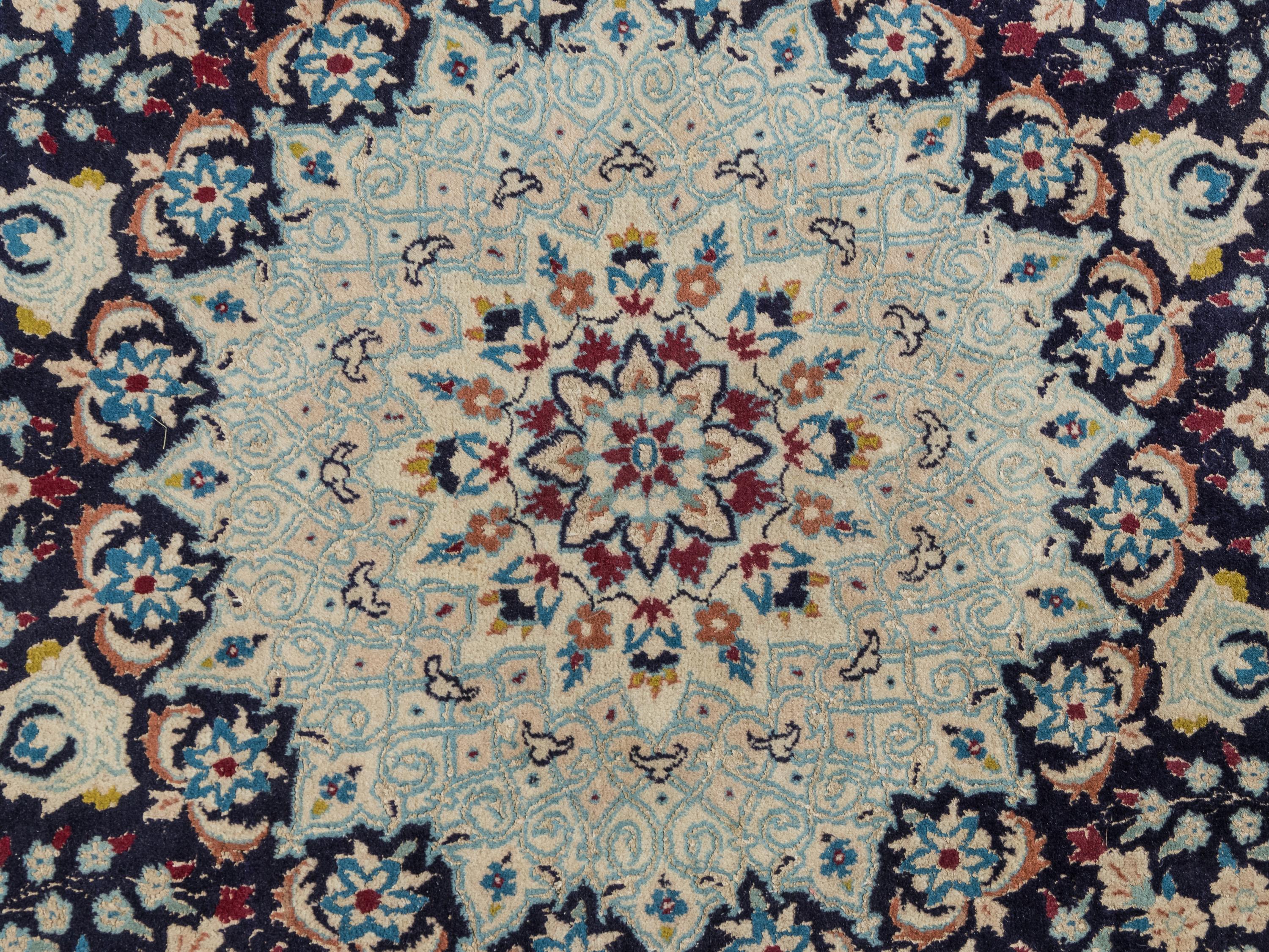 A Persian Nain Wool Circular Rug