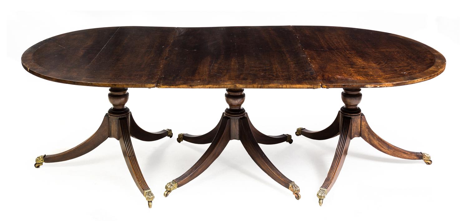 A George III Mahogany Triple Pedestal Dining Table Height 27 1/2 x width 107 x depth 45 inches. — EARLY 19TH CENTURY