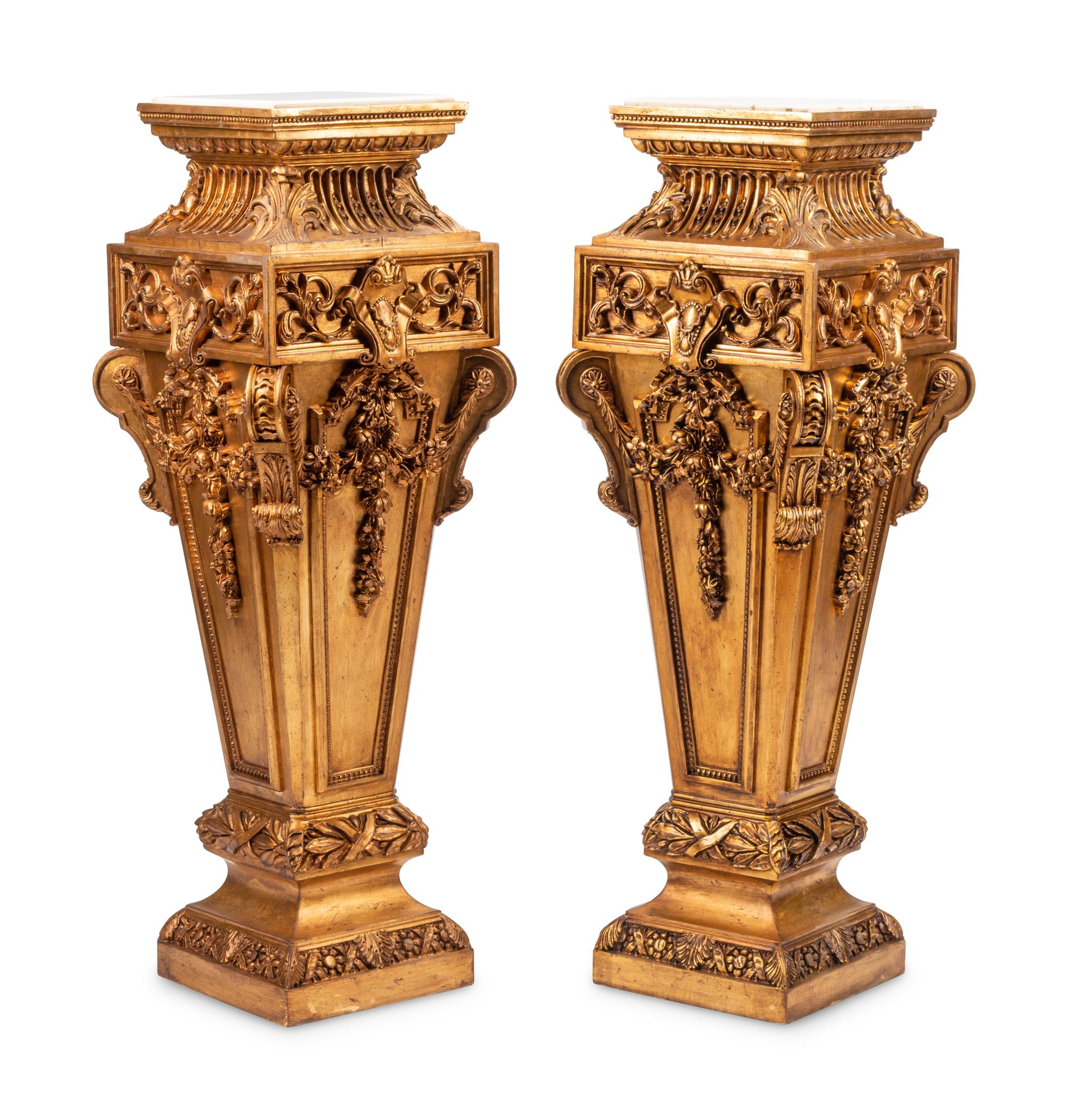 A Pair of Régence Style Giltwood Marble-Top Pedestals