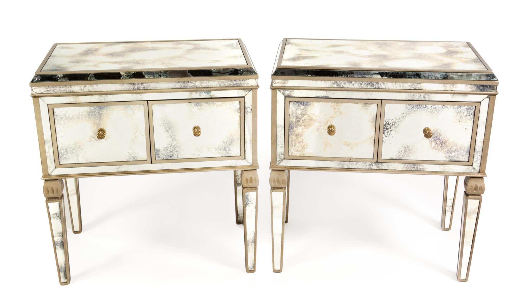 A Pair of Italian Style Mirrored Bedside Cabinets Height 33 x width 29 3/4 x depth 17 3/4 inches. — AMY HOWARD, 20TH CENTURY