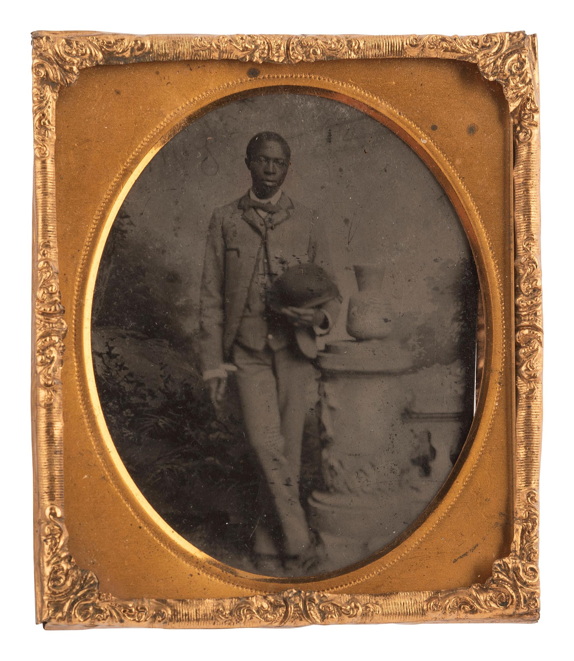 [EARLY PHOTOGRAPHY]. 6 photos of African American subjects, incl. sixth plate tintype of young man.