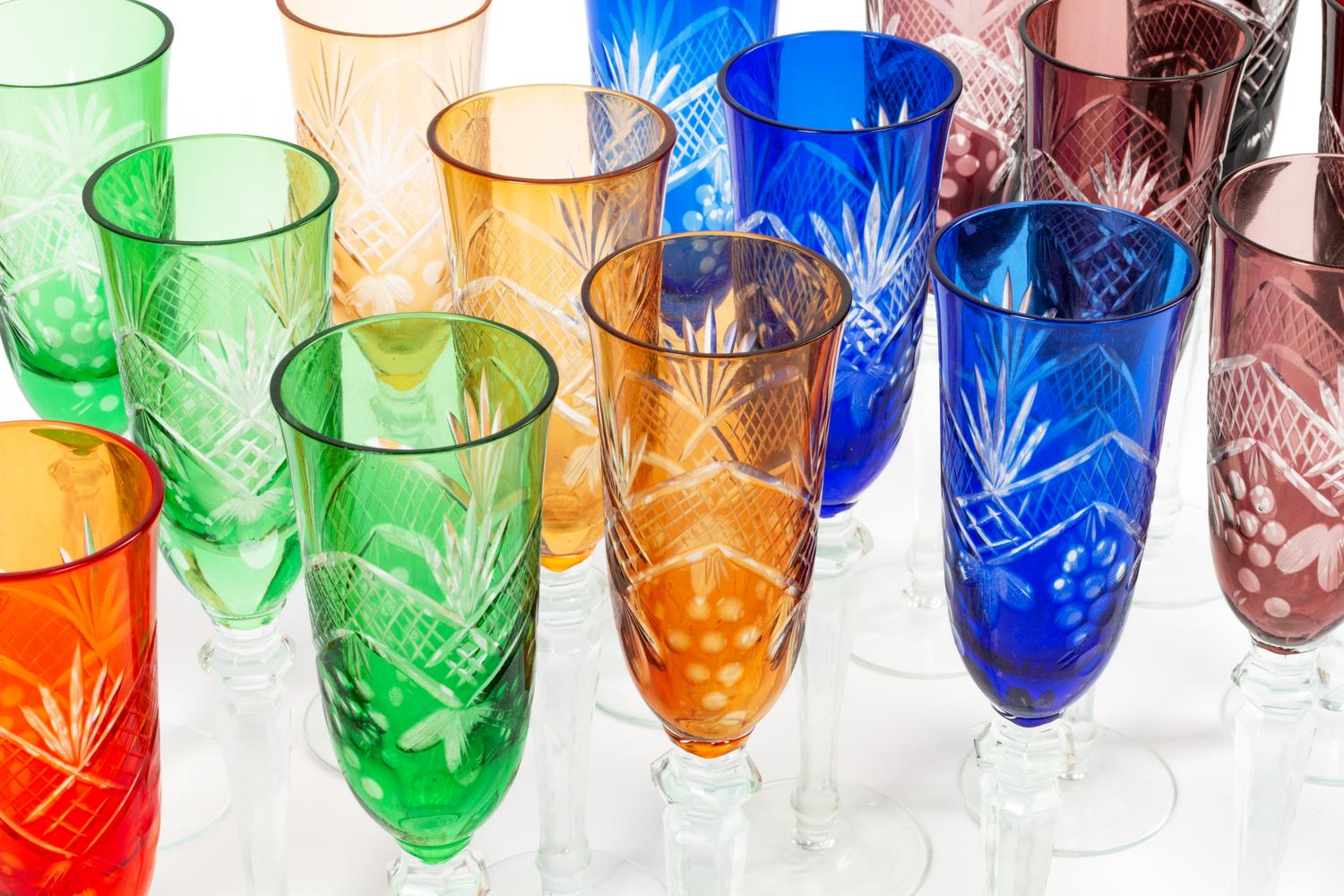A Set of Eighteen Colored Cut-to-Clear Glass Goblets
