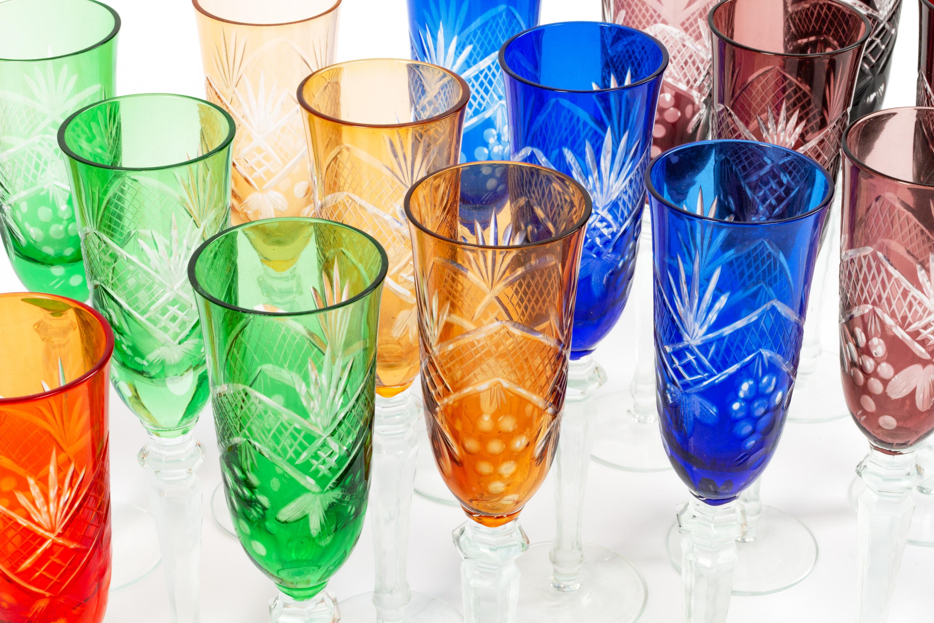 A Set of Eighteen Colored Cut-to-Clear Glass Goblets
