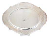 An American Silver Oval Tray, Reed & Barton, Taunton, MA, having a shaped floral and foliate etched border, monogrammed.