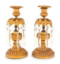 A Pair of Gilt Metal and Glass Candlesticks