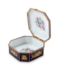 A Sèvres Style Painted and Parcel Gilt Porcelain Table Casket