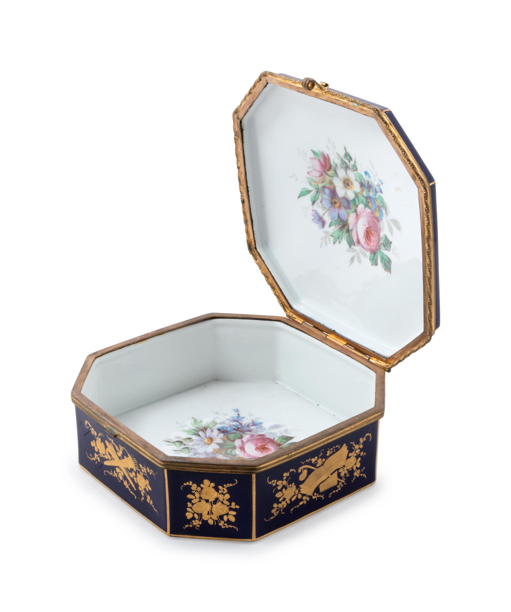 A Sèvres Style Painted and Parcel Gilt Porcelain Table Casket