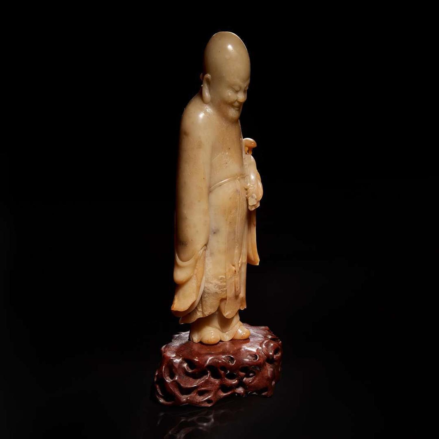 A Chinese carved soapstone figure of Shoulao 壽山石雕羅漢 Qing dynasty ?