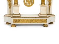 A French Gilt Bronze and White Marble Mantel Clock