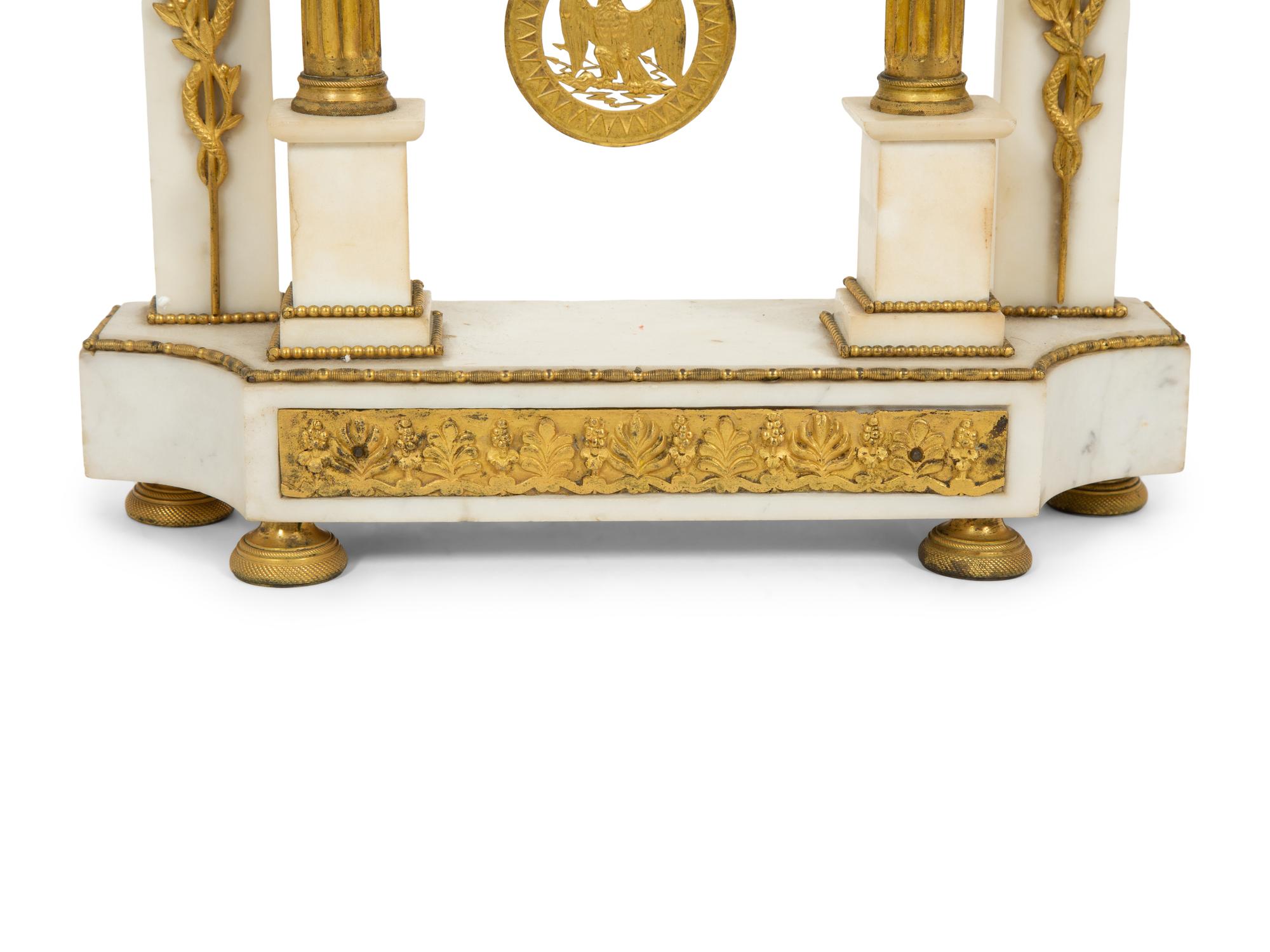 A French Gilt Bronze and White Marble Mantel Clock