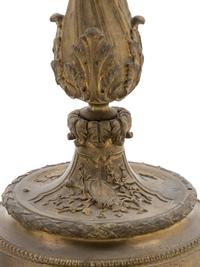 A French Gilt Bronze Candlestick and Figural Mirror