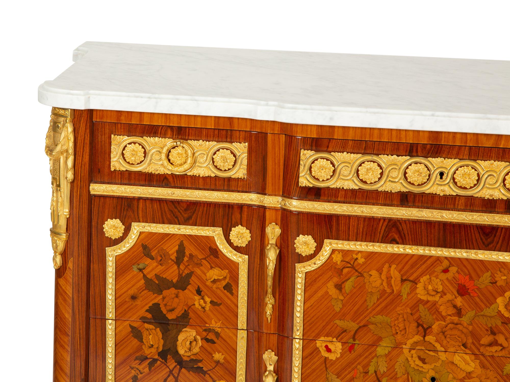 A Pair of Louis XV/XVI Transitional Style Gilt Bronze Mounted Marquetry Marble-Top Commodes