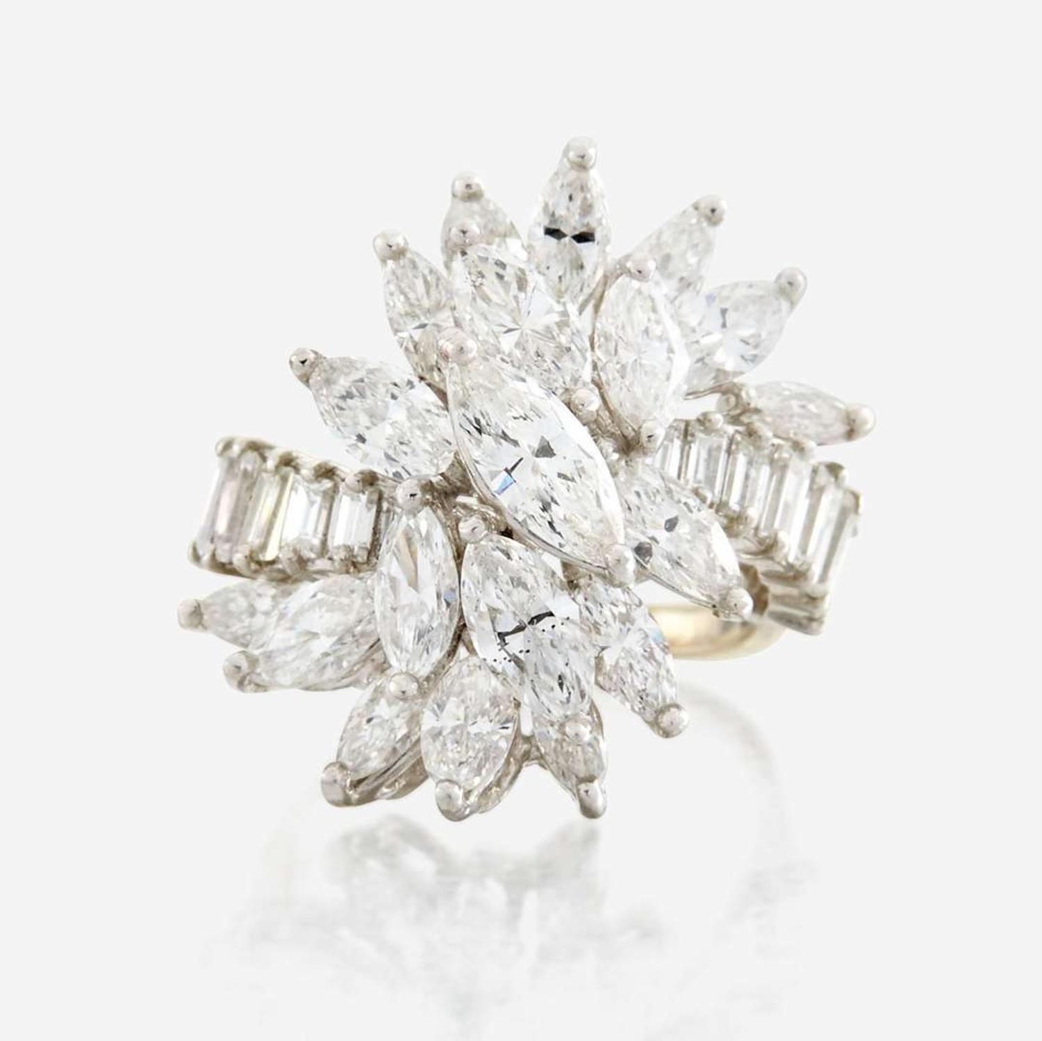 A diamond, platinum, and white metal ring